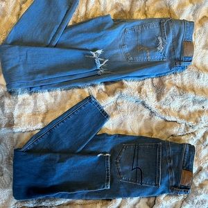 Two pairs of size 8 American eagle skinny jeans.